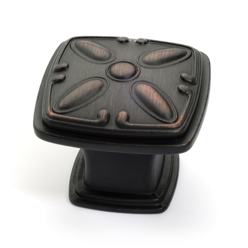 Square drawer knob in oil rubbed bronze finish with decorative emboss on the face 