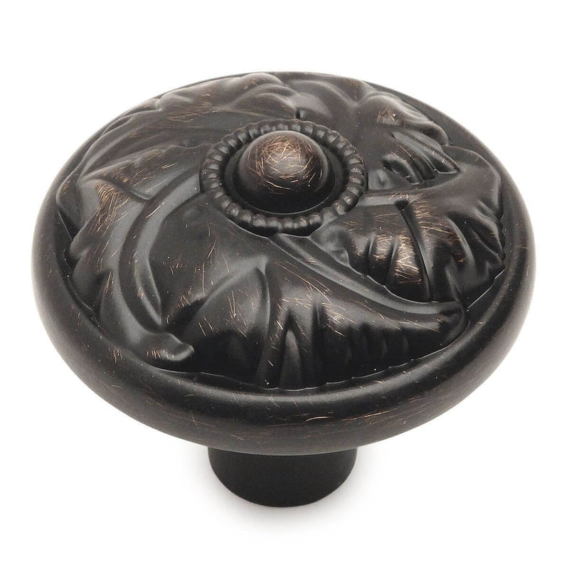 Oil rubbed bronze cabinet knob with leaf etchings and one and a quarter inch diameter