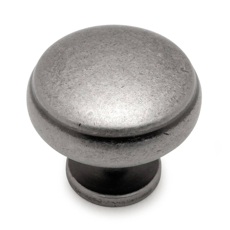 One and three sixteenths inch diameter drawer knob with subtle beveled lip on the top in weathered nickel finish