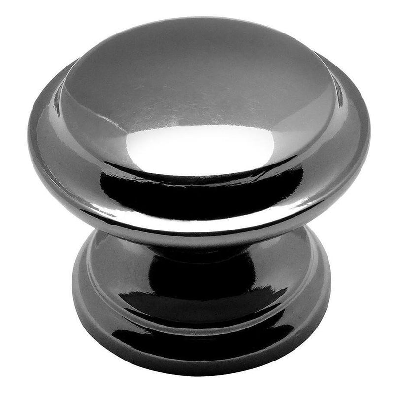Subtle raised centre drawer knob in black nickel finish with one and three eighths inch diameter