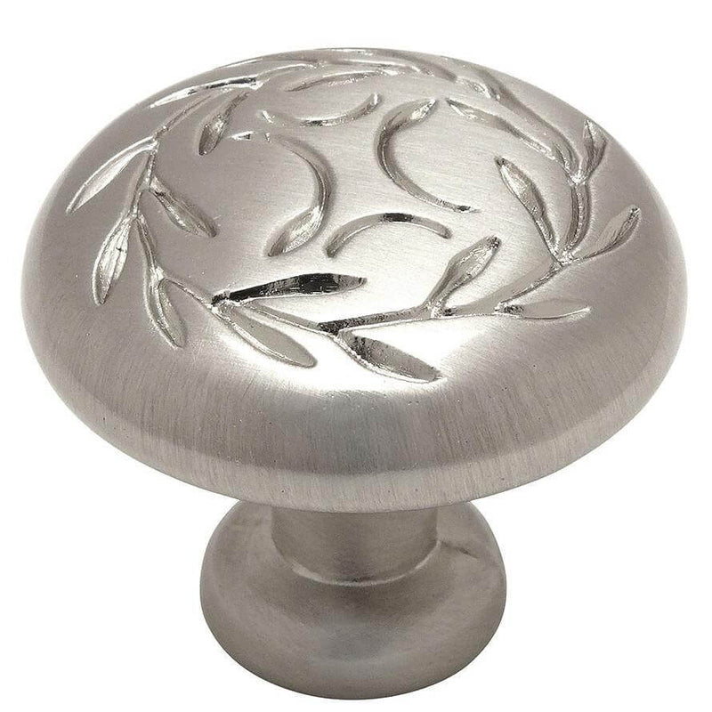 Cabinet drawer knob in satin nickel finish with leaves engraving on the face