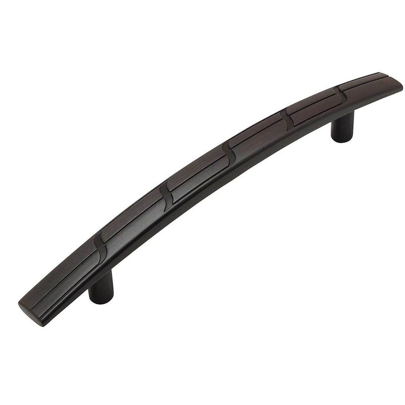 Oil rubbed bronze drawer pull with five inch hole spacing and decorative engraving on top