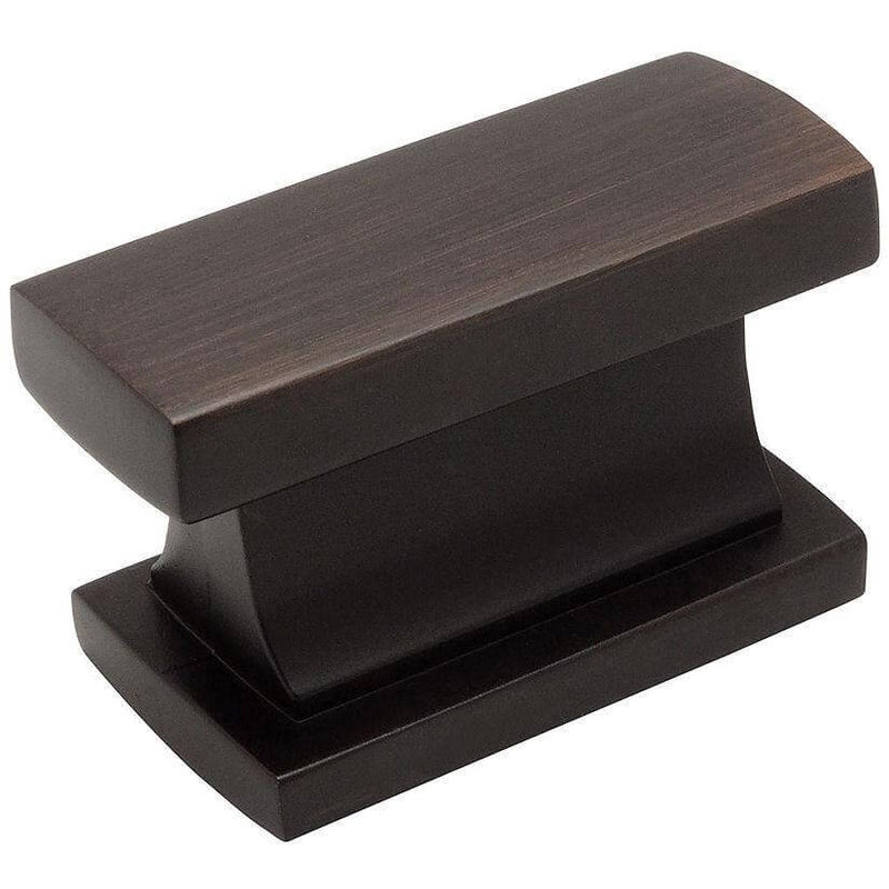 Cabinet knob in rectangular shape and oil rubbed bronze finish with one and seven sixteenths inch width