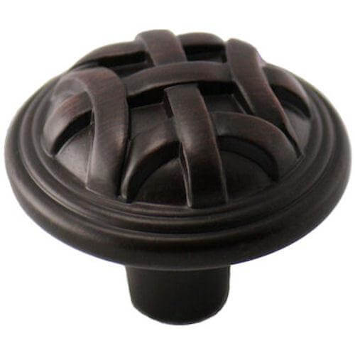 Cabinet knob in oil rubbed bronze finish with woven lines design and one and a quarter inch diameter