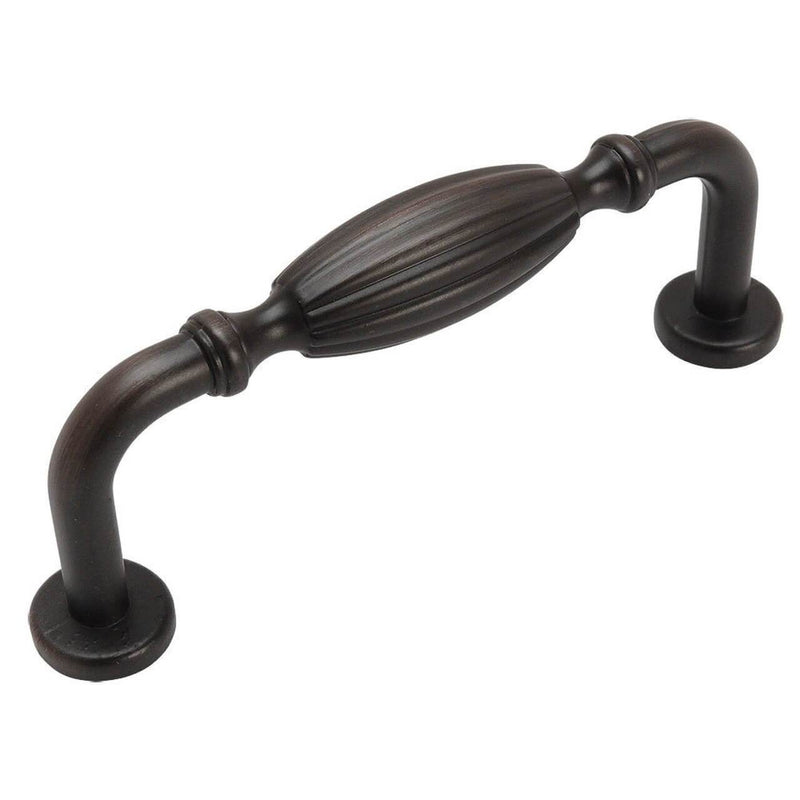 Three inch hole spacing cabinet pull in oil rubbed bronze finish with an engraved oval form in the middle