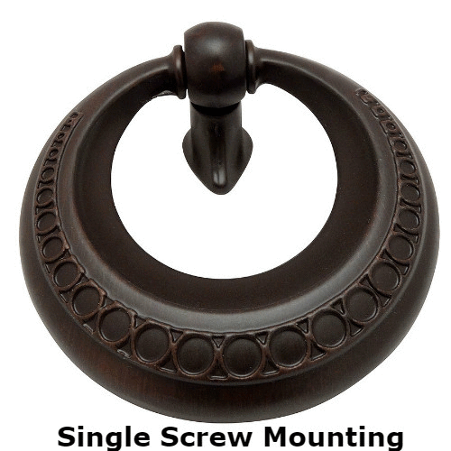 Cabinet knob in oil rubbed bronze finish with a hole in the centre and rings carving around the edges