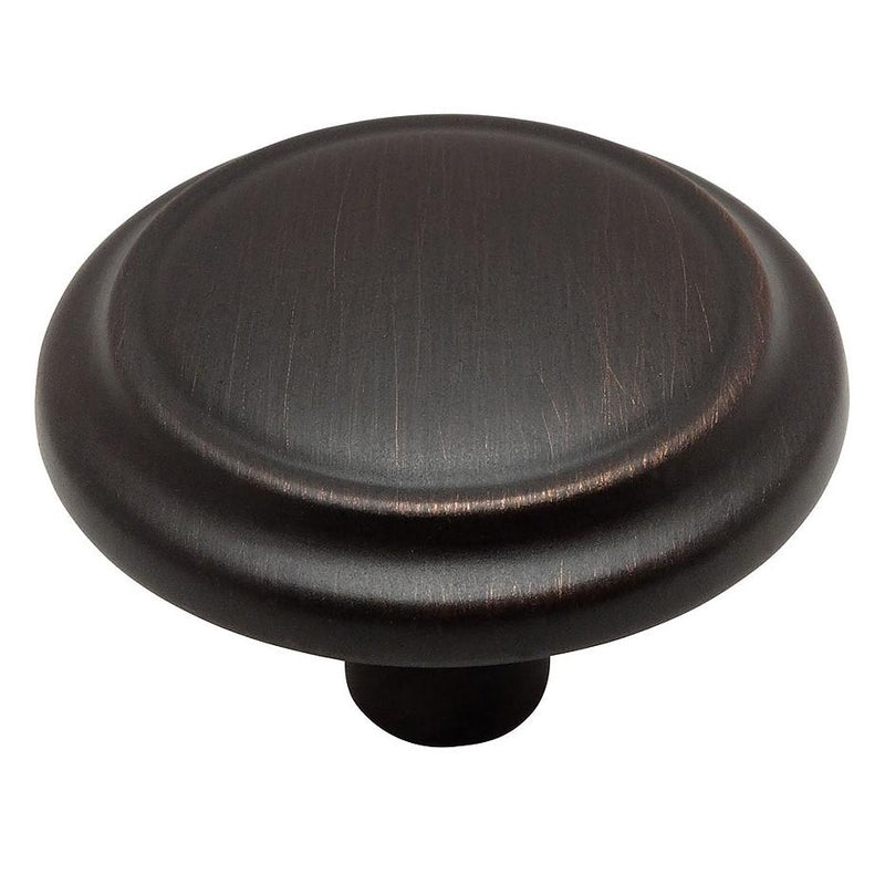 One and a quarter inch diameter cabinet drawer in oil rubbed bronze finish and slightly raised centre design
