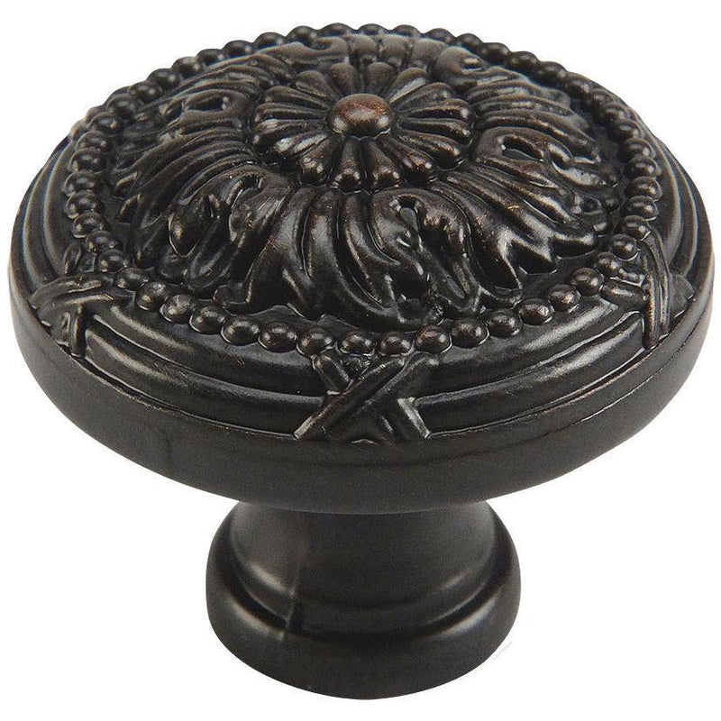 Oil rubbed bronze cabinet knob with decorative classic engraving and one and a quarter inch diameter