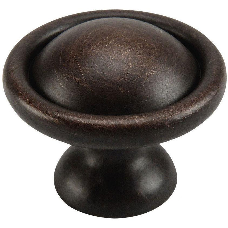 Round cabinet knob in oil rubbed bronze finish with thicker subtle  edges