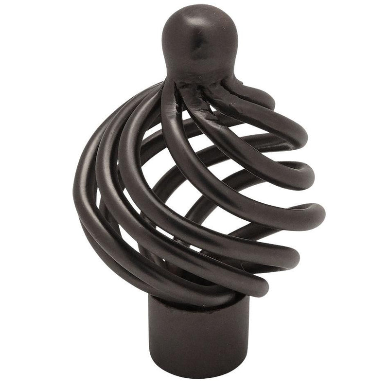 Round cabinet knob in oil rubbed bronze finish with one and a quarter inch diameter and birdcage design