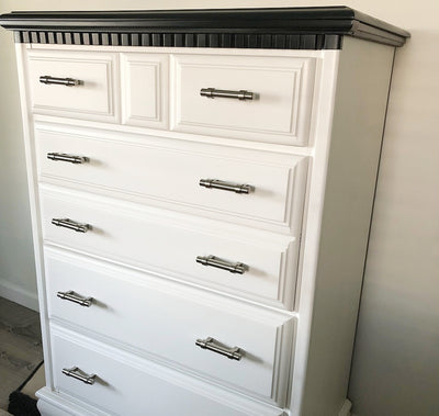 White hutch with black top and dental moulding and satin nickel bar pulls