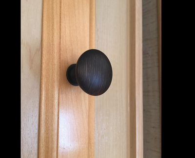 upclose view of the Cosmas 5305ORB Oil Rubbed Bronze Round Cabinet Knob