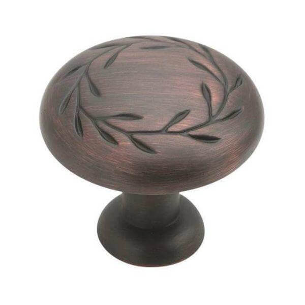 Round oil rubbed bronze cabinet knob with leaves design