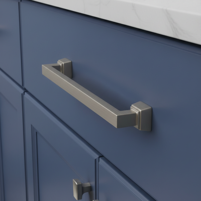 Metallic cabinet handle on a white background