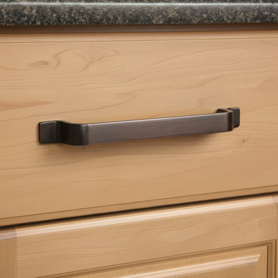 An oil rubbed bronze contemporary cabinet pull with a sleek, rectangular design.