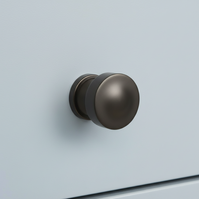 graphite cabinet door handle on a light gray background