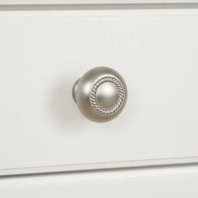 Silver rope cabinet knob on a white drawer
