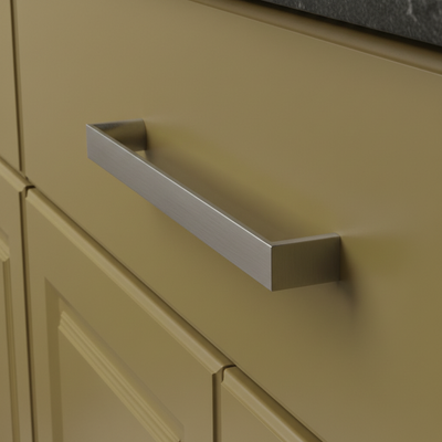A satin nickel cabinet pull with a sleek, modern design.
