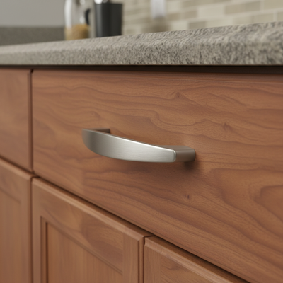 Wooden cabinet with a metal handle in a kitchen setting