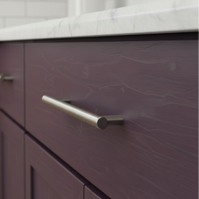 Close-up of a purple drawer with a silver handle in a kitchen setting.