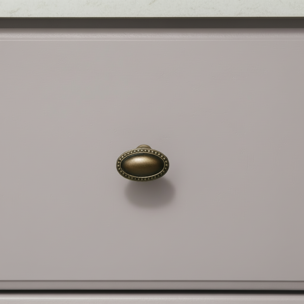 Close-up of a light purple drawer with a gold handle on a white background