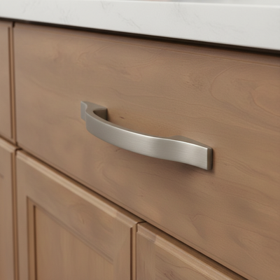  satin nickel by cosmas 4307sn on a wooden cabinet drawer
