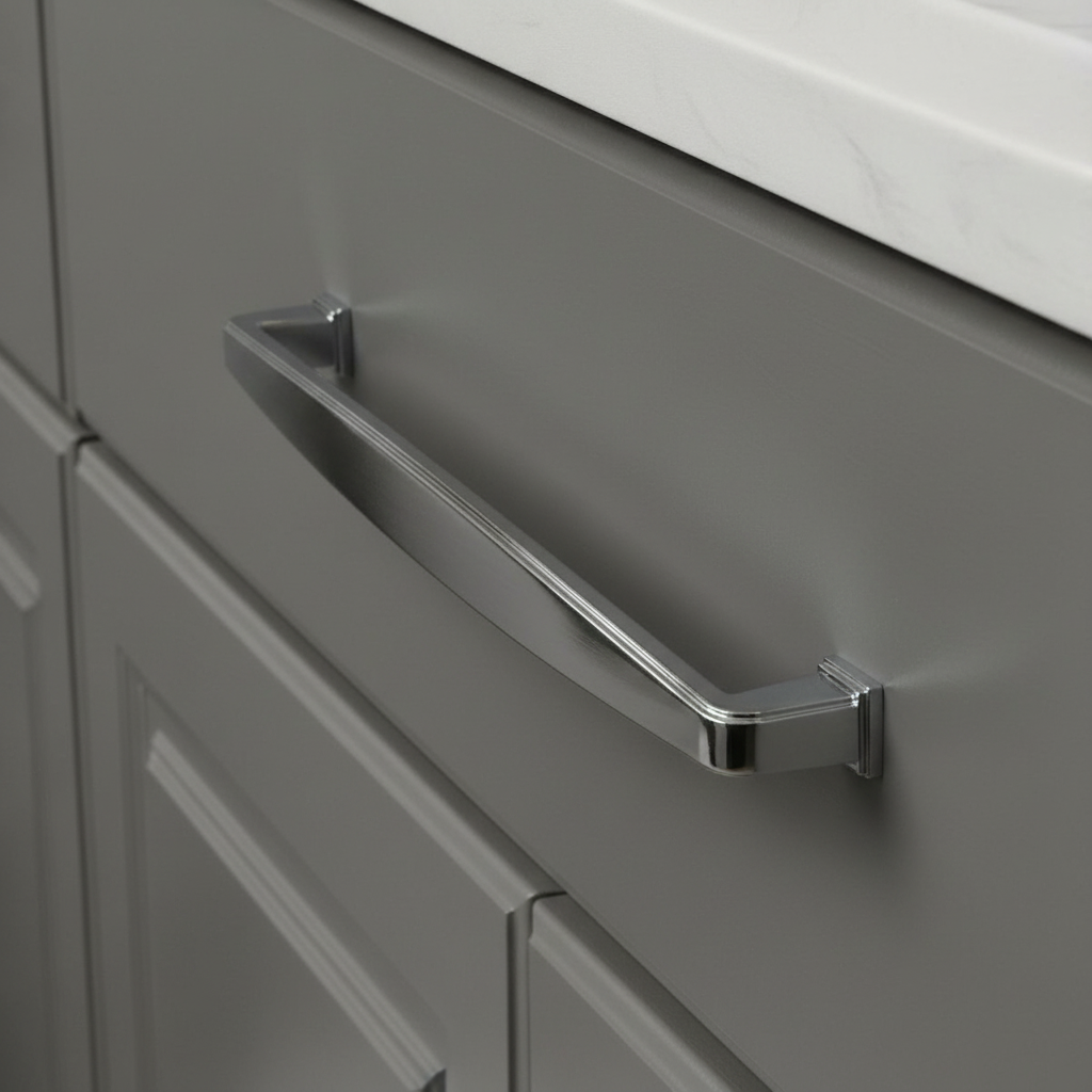 Subtle wide design drawer pull in polished chrome finish on gray kitchen drawer