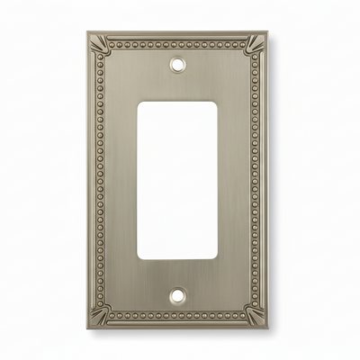 Decorative metal wall plate with beaded border on a white background