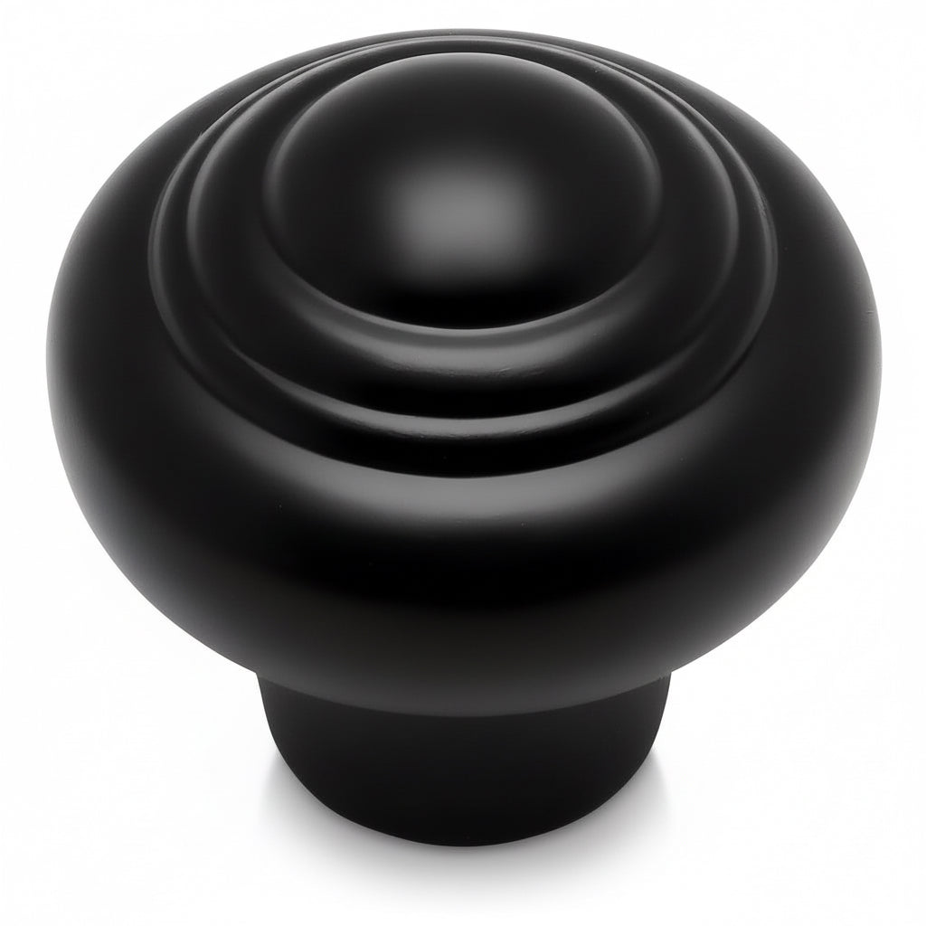 Black knob on a white background