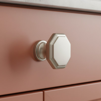 Octagon shaped knob on a terracotta drawer 