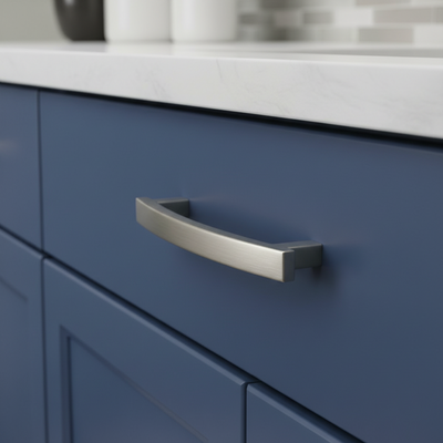 Blue cabinet with a silver handle in a kitchen setting