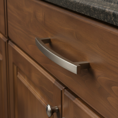 Close-up of a wooden cabinet with a metallic handle