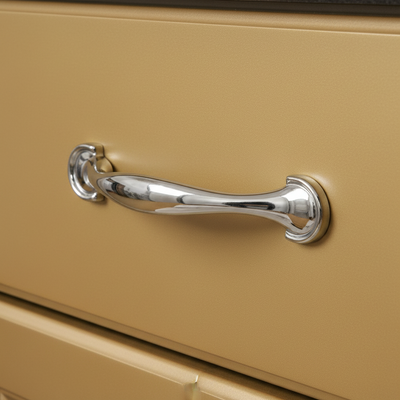 Polished metal handle on a white background