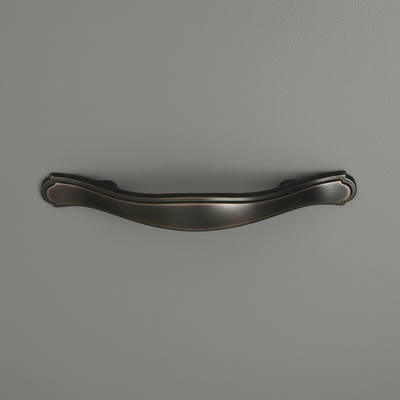 oil rubbed bronze cabinet pull on a gray drawer 