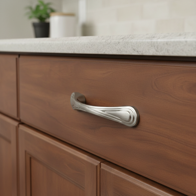 Wooden cabinet with a silver handle in a kitchen setting