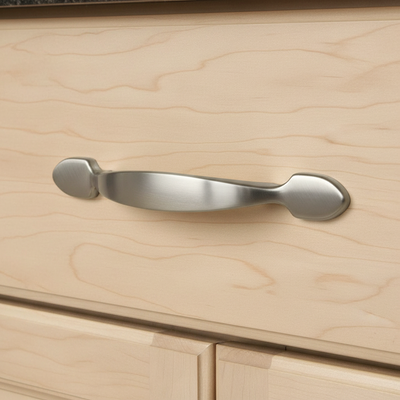 SATIN NICKEL cabinet handle on a wooden drawer