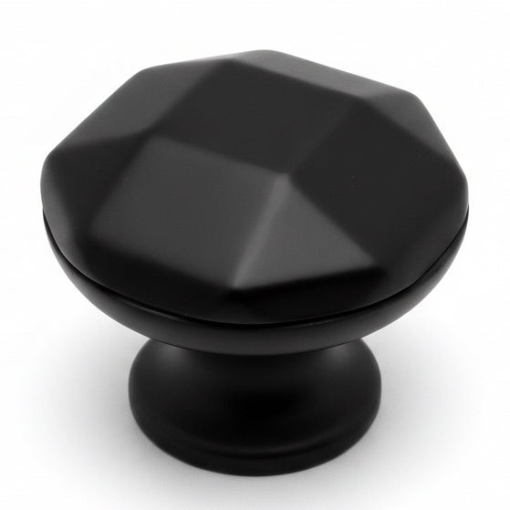 Black geometric cabinet knob on a white background