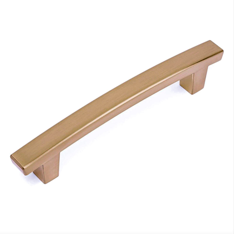 A gold champagne arch cabinet pull designed for use in kitchen or bathroom cabinetry.