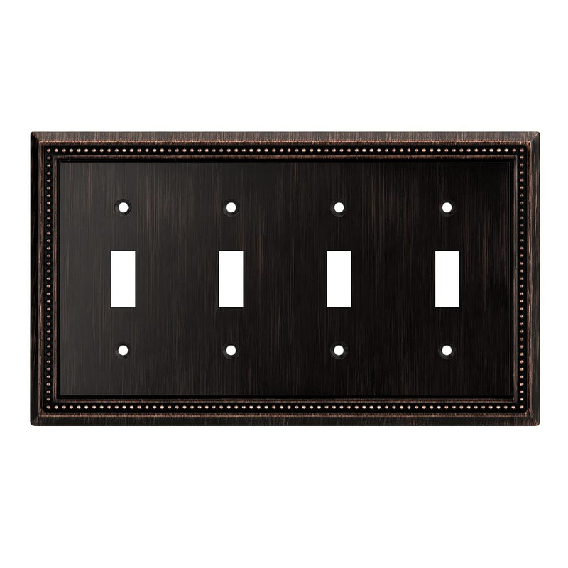 Dark bronze switch plate with four toggle switches on a white background