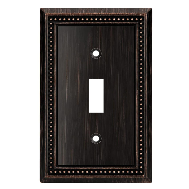 Oil rubbed bronze switch plate with decorative border on a white background