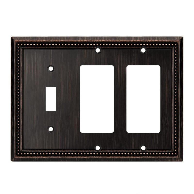 Decorative wall plate with three sockets on a white background