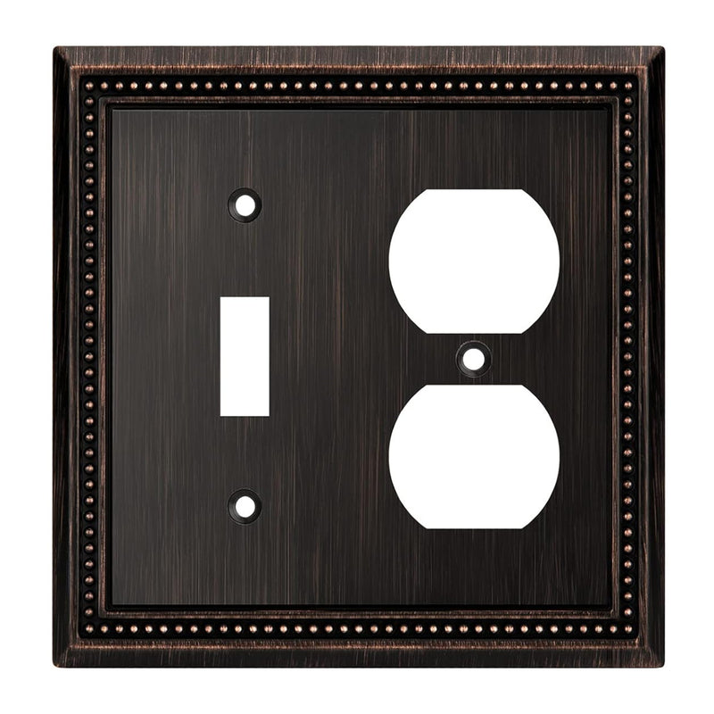Bronze switch plate with white outlet and switch icons on a white background
