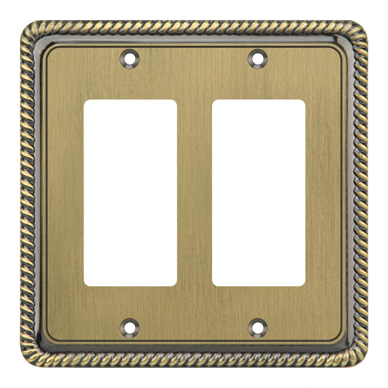 Double gang brass wall plate with decorative border