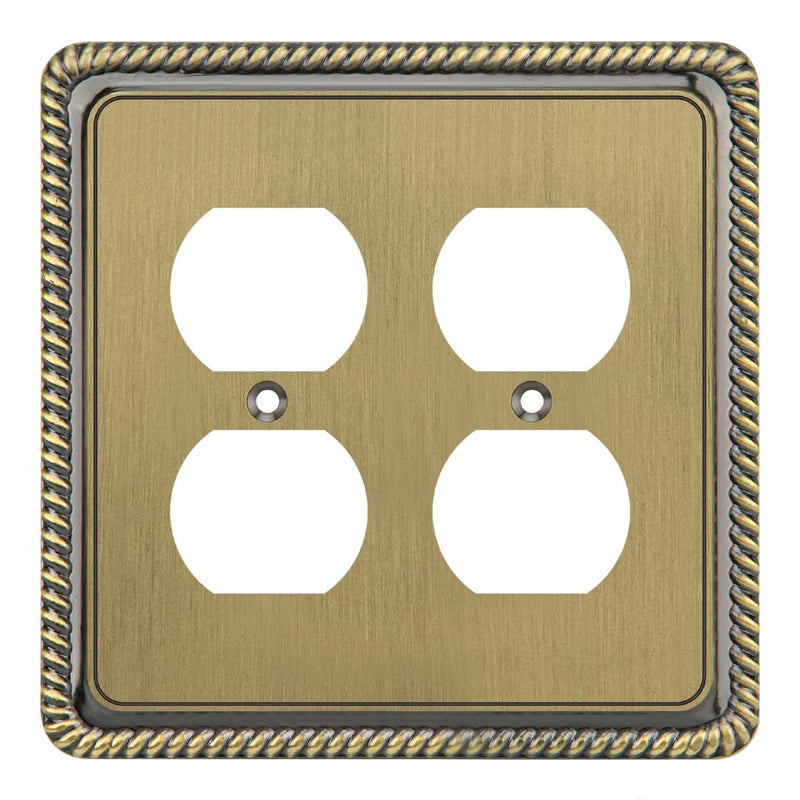 Double outlet wall plate with decorative border on a white background