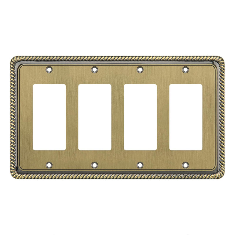 Brass quad gangway switch plate with decorative border on a white background