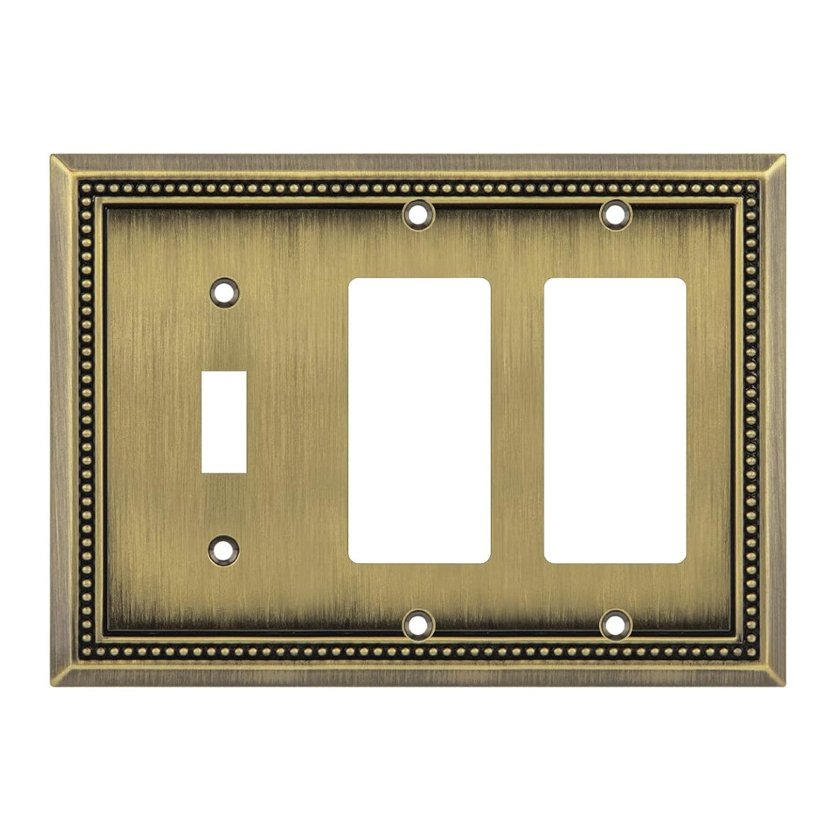 Decorative antique brass switch plate with three outlets on a white background