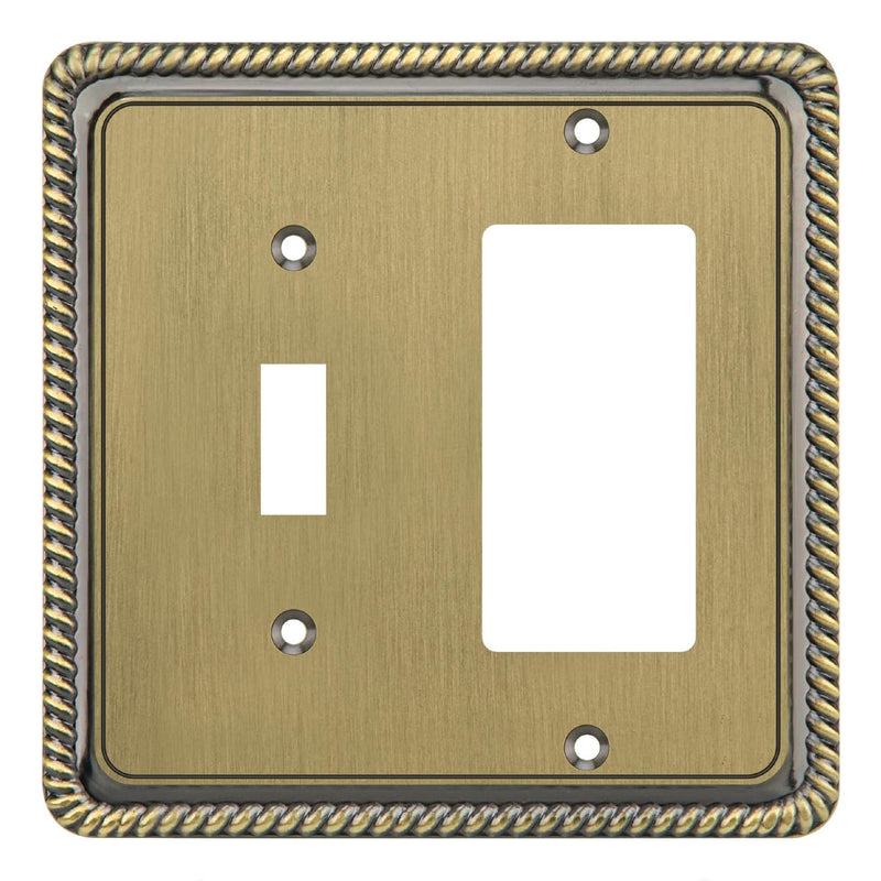 Decorative brass wall plate with a single switch and a blank rocker slot on a white background