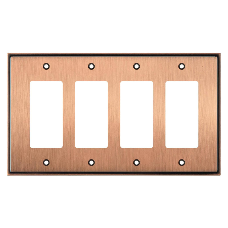 Copper-colored electrical wall plate with four sockets on a white background