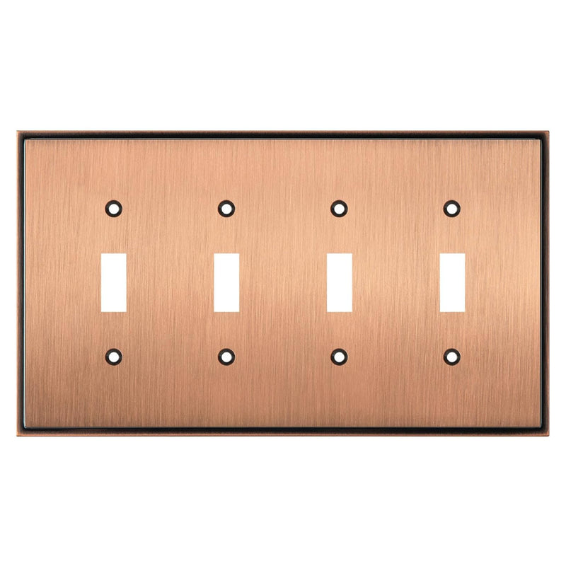 Copper-colored switch plate with four toggle switches on a white background