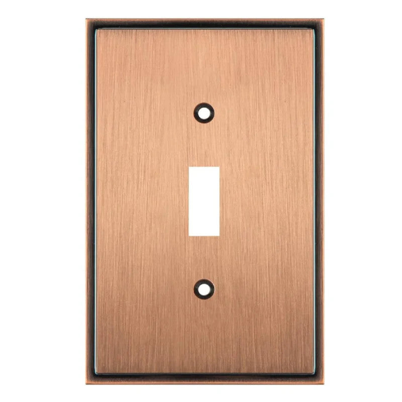 Copper-colored switch plate with a single toggle switch slot on a white background